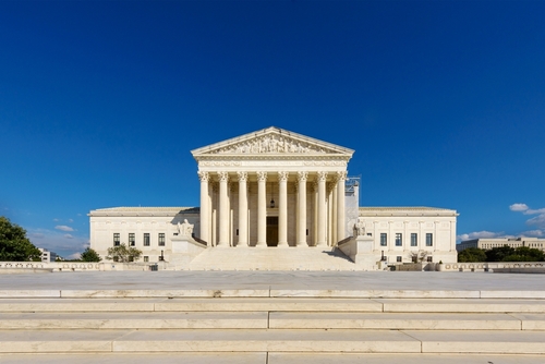 Wide view of the Supreme Court in Washington, symbolizing legal decisions affecting wildfire victims’ compensation.